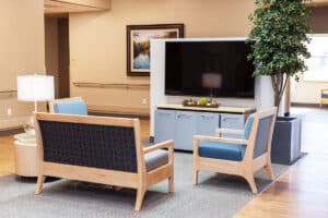 Central lobby and sitting room with a big screen TV